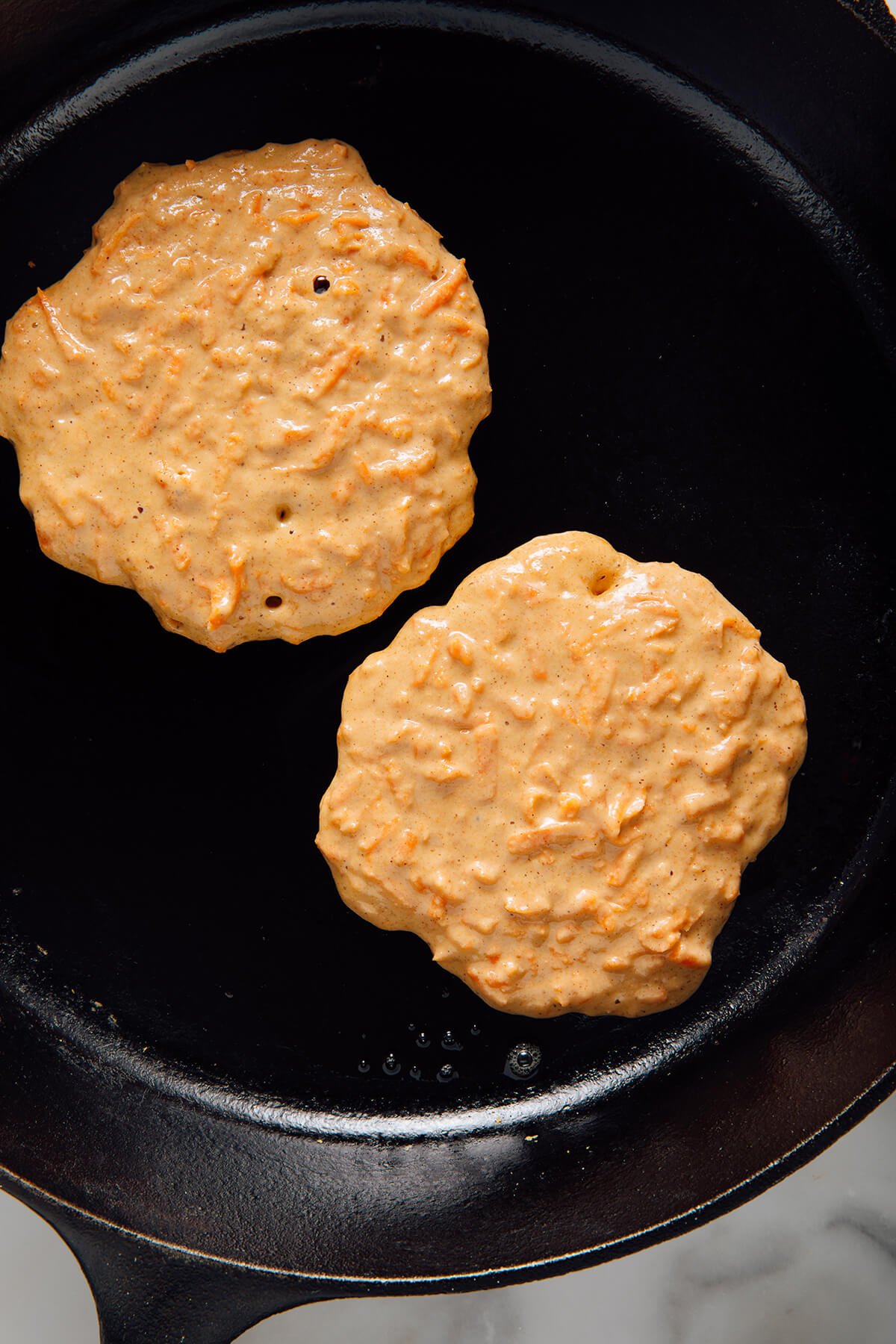 carrot cake pancakes before flipping