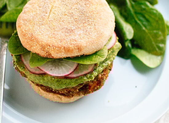 Lentil-chickpea veggie burgers with avocado green harissa and radish - cookieandkate.com