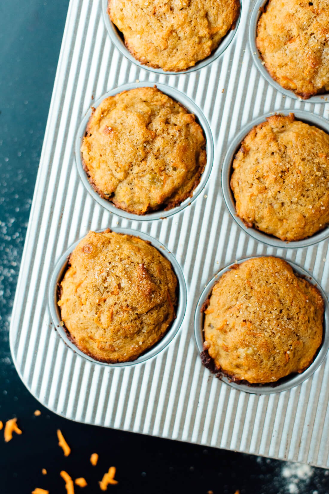 Healthy carrot muffins made with whole wheat flour, coconut oil and maple syrup