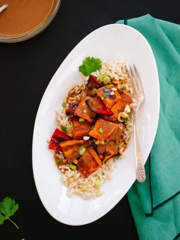 Spicy Thai Peanut Sauce over Roasted Sweet Potatoes and Rice